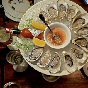 Monica Selects Doindubai Flooka Oysters and prosecco Moncia Kapila